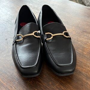 Sleek Black Loafers with Gold Accents